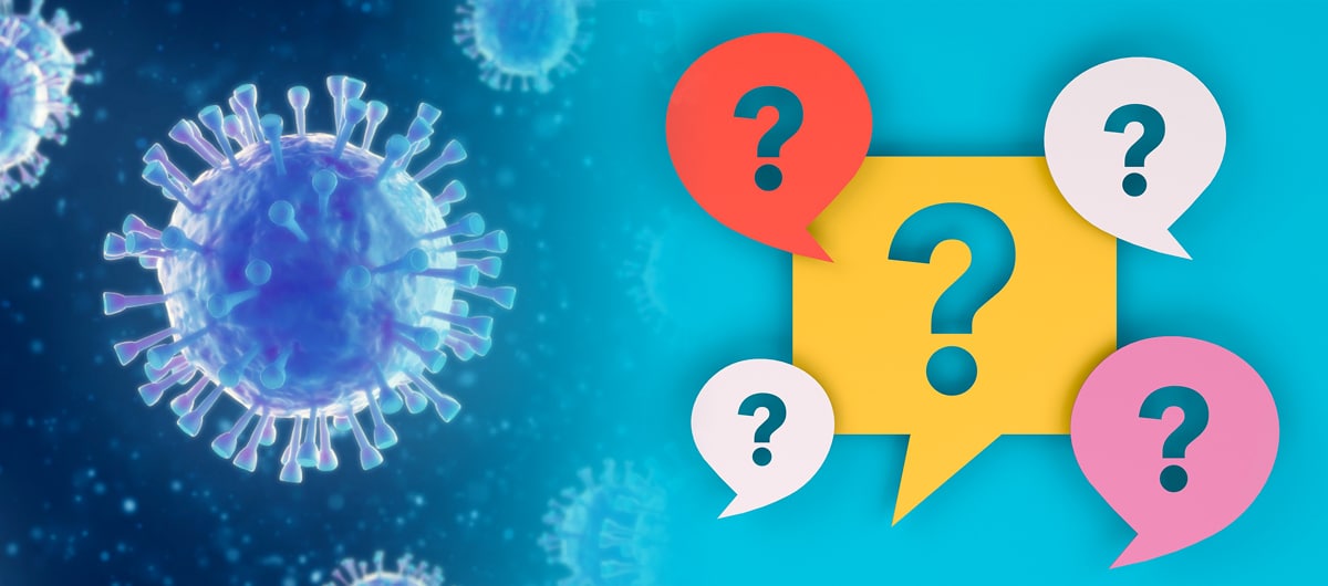 A graphic of a virus next to speech bubbles containing question marks.